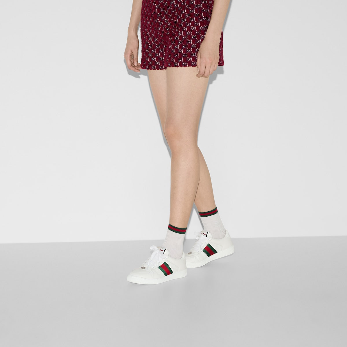 Screener sneaker – here the emblematic style is presented in white leather with an embossed GG leather – LUX VERSE Luxury Designer Fashion Outlet