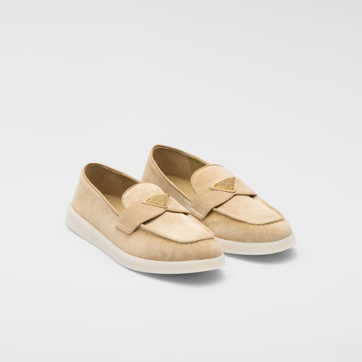 Suede leather loafers – the enameled metal triangle logo embellishes the band, while the rubber sole adds – LUX VERSE Luxury Designer Fashion Outlet