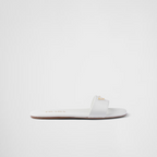 Leather slides – enameled metal triangle logo Monoblock leather sole, 5 mm, with hot-stamped logo – LUX VERSE Luxury Designer Fashion Outlet