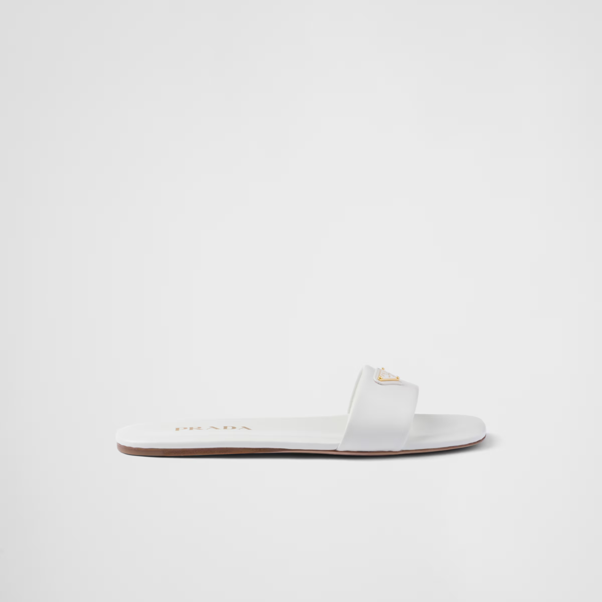 Leather slides – enameled metal triangle logo Monoblock leather sole, 5 mm, with hot-stamped logo – LUX VERSE Luxury Designer Fashion Outlet