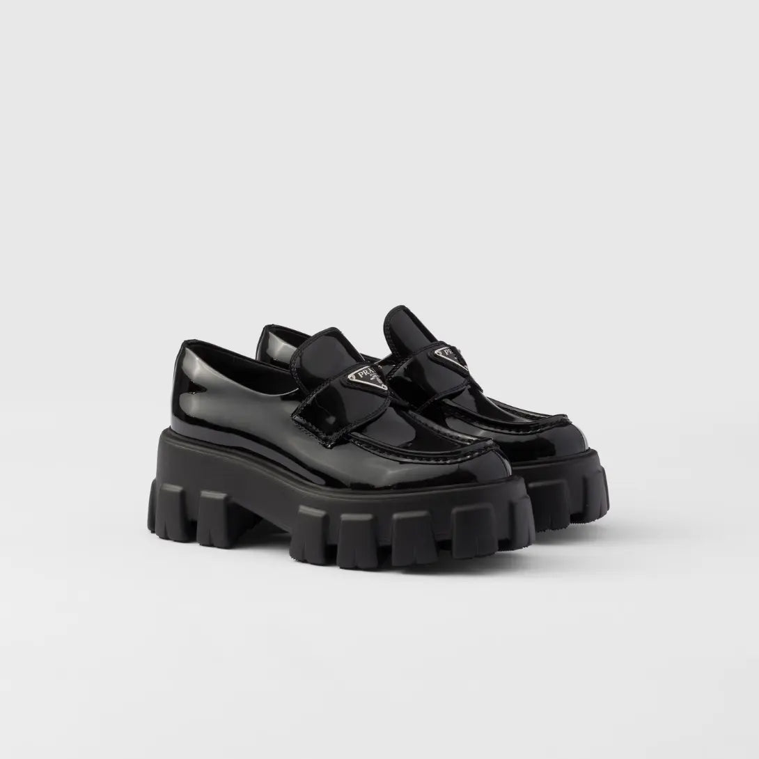 Monolith patent leather loafers – these bold, original loafers stand out for their hybrid design emphasized by – LUX VERSE Luxury Designer Fashion Outlet