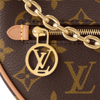 Loop Handbag – it has a body-friendly, compact shape and a chain for shoulder carry, as well as – LUX VERSE Luxury Designer Fashion Outlet