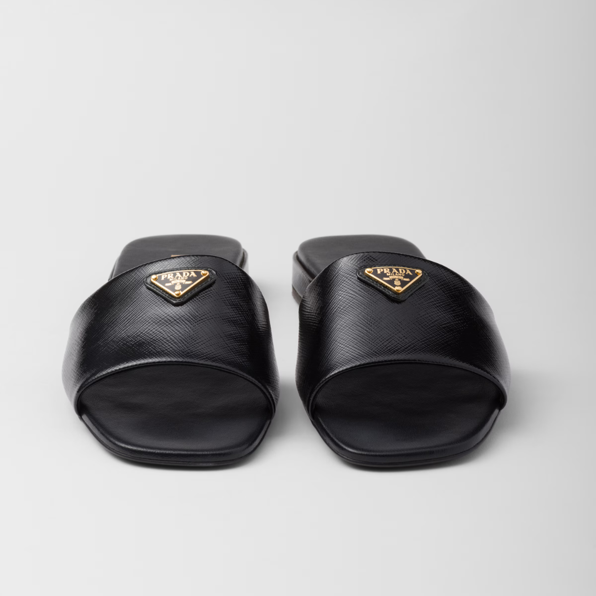 Saffiano patent leather slides – the distinctive crosshatch pattern of Saffiano leather, a signature material – LUX VERSE Luxury Designer Fashion Outlet