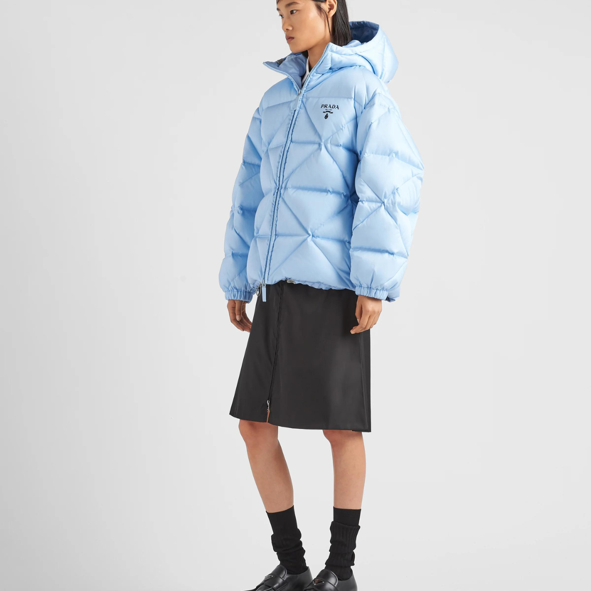 Oversized Re-Nylon Gabardine down jacket – a vintage-inspired oversized silhouette characterizes this down jacket made – LUX VERSE Luxury Designer Fashion Outlet