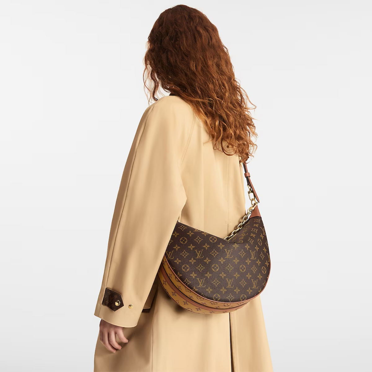 Loop Hobo – its on-trend half-moon shape is emphasized by the leather corners – LUX VERSE Luxury Designer Fashion Outlet