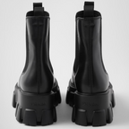 Monolith brushed leather booties – these original, bold booties enhance the duality concept that is fundamental in – LUX VERSE Luxury Designer Fashion Outlet