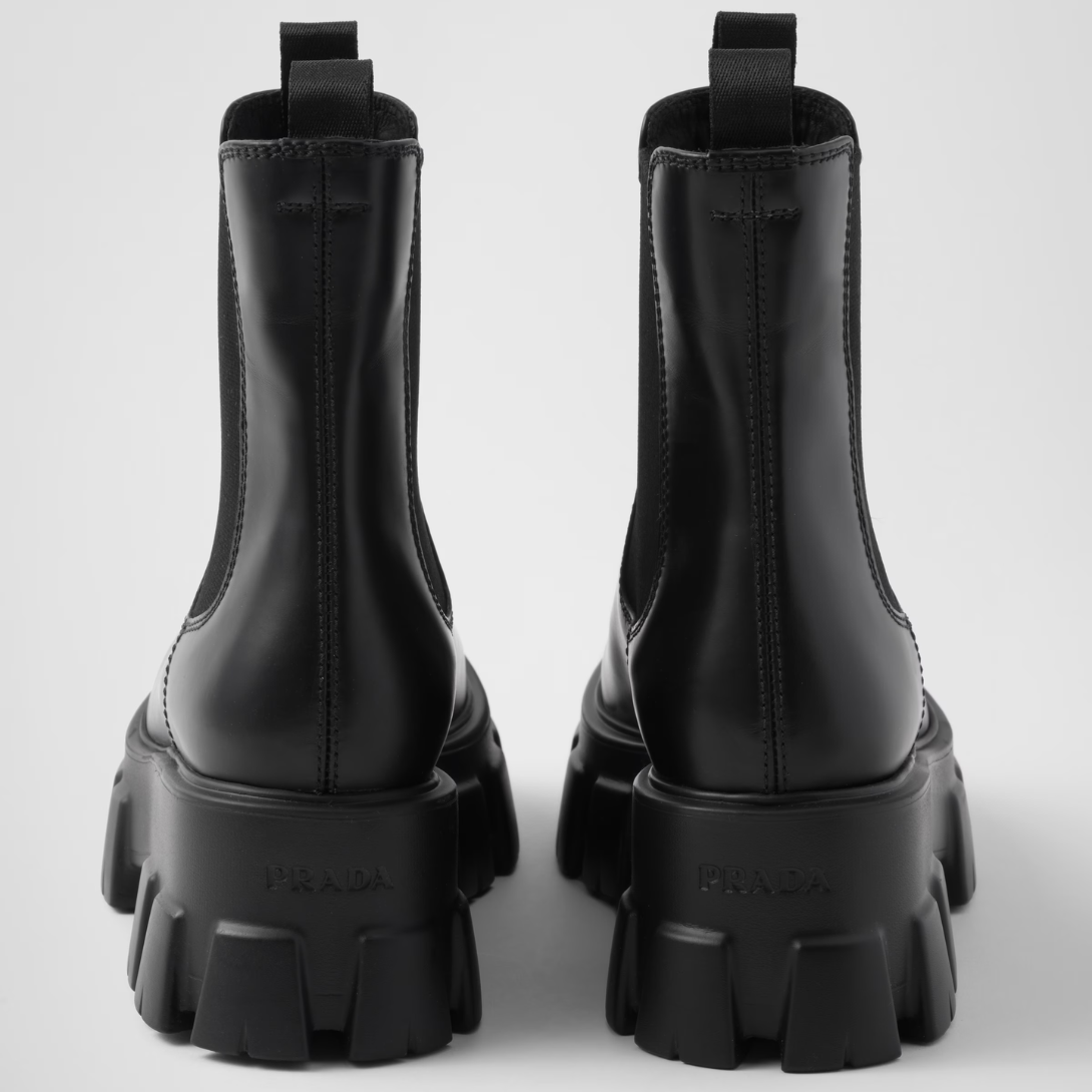 Monolith brushed leather booties – these original, bold booties enhance the duality concept that is fundamental in – LUX VERSE Luxury Designer Fashion Outlet