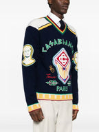 Navy Wollpullover mit Rundhalsausschnitt und Wappen-Intarsie – Herren