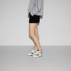 Re-Web sneaker leather – this pair is crafted from white leather with a black trim – LUX VERSE Luxury Designer Fashion Outlet
