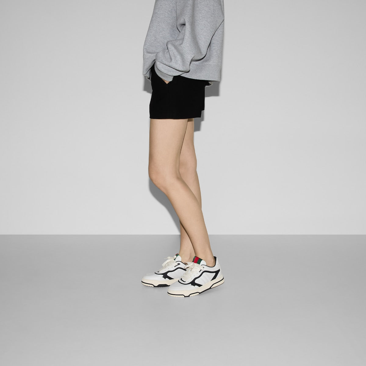 Re-Web sneaker leather – this pair is crafted from white leather with a black trim – LUX VERSE Luxury Designer Fashion Outlet