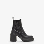 Domino – domino biker boots with round toes and elastic inserts at the sides – LUX VERSE Luxury Designer Fashion Outlet