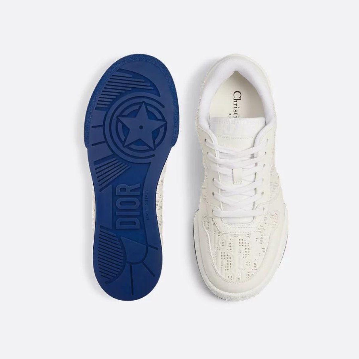 One Sneaker – crafted in white calfskin, it is distinguished with perforated inserts that reveal – LUX VERSE Luxury Designer Fashion Outlet