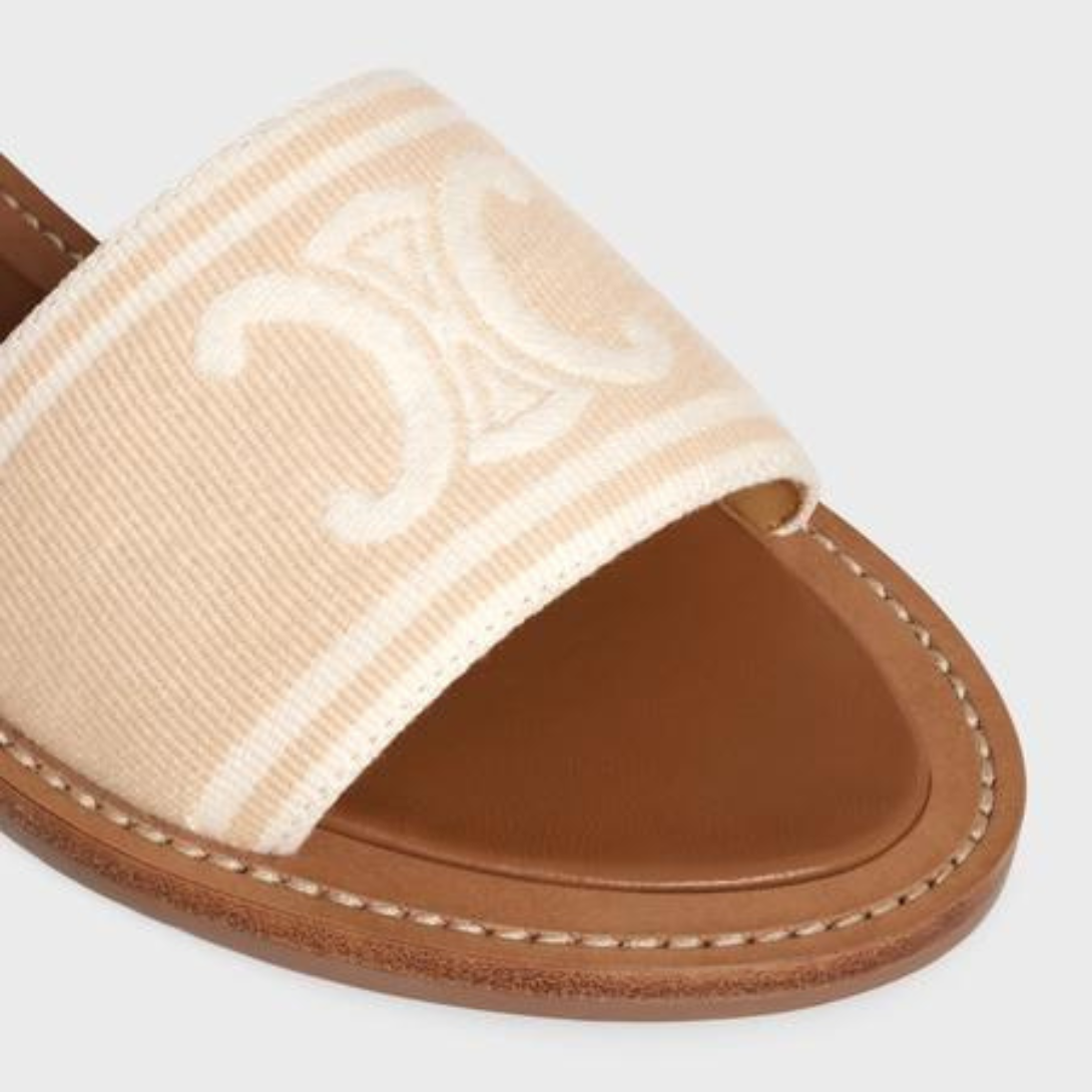 LYMPIA SANDAL in TRIOMPHE JACQUARD CANVAS & CALFSKIN – 50% COTTON & 50% CALFSKIN100% Calfskin Lining0.6 IN (15 MM) heelROUND – LUX VERSE Luxury Designer Fashion Outlet
