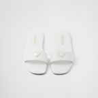 Leather slides – enameled metal triangle logo Monoblock leather sole, 5 mm, with hot-stamped logo – LUX VERSE Luxury Designer Fashion Outlet