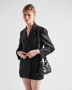 Moon Re-Nylon and leather bag – the observation of apparently distant areas leads to innovative combinations and a – LUX VERSE Luxury Designer Fashion Outlet