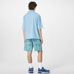 Printed Nylon Swim Shorts Vibrant Greeen – these summery swim shorts in vibrant green tones evoke dappled light on water – LUX VERSE Luxury Designer Fashion Outlet