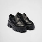 Brushed leather Monolith loafers – upper with leather band and metal triangle logo Apron with stitched raised edge – LUX VERSE Luxury Designer Fashion Outlet