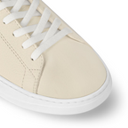 Resort Sneaker – its understated design is complemented by discreet signatures, including – LUX VERSE Luxury Designer Fashion Outlet