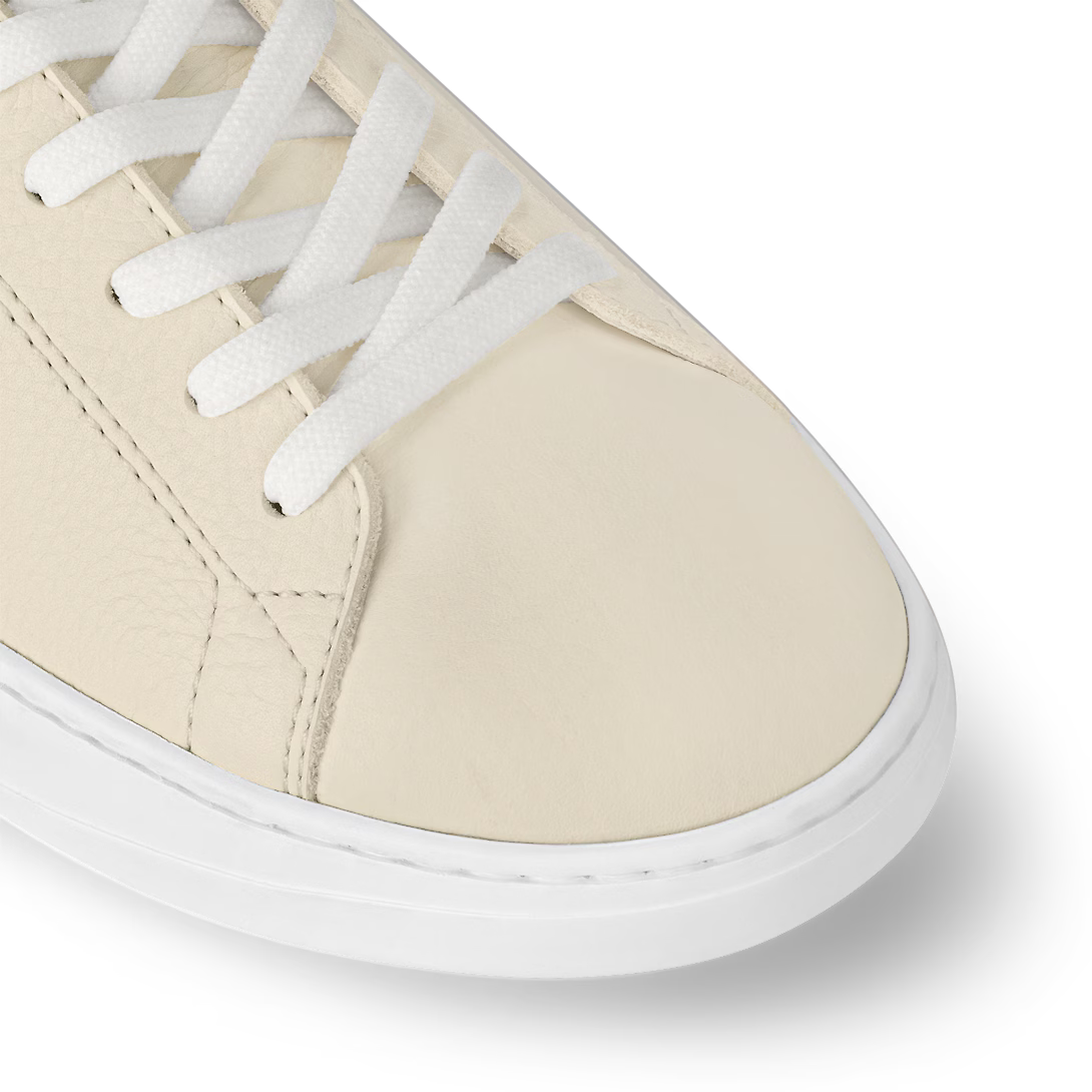 Resort Sneaker – its understated design is complemented by discreet signatures, including – LUX VERSE Luxury Designer Fashion Outlet