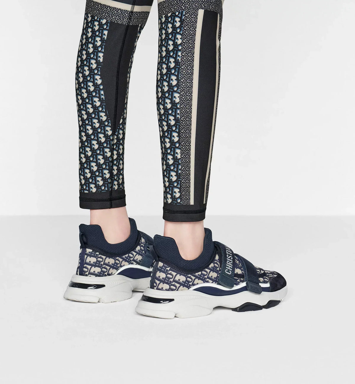D-Wander Sneaker – embellished with a deep blue Oblique motif in technical fabric, the style has – LUX VERSE Luxury Designer Fashion Outlet
