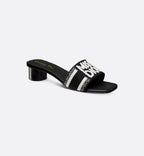 Dway Heeled Slide – the Dway heeled slide showcases the white Miss Graffiti motif, a nod to the 1967 – LUX VERSE Luxury Designer Fashion Outlet