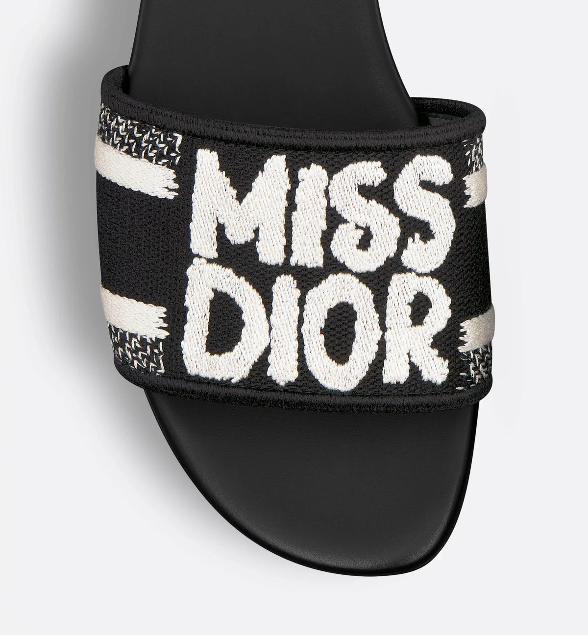 Dway Leather Slide – the Dway slide features a black upper embroidered with the white Miss Graffiti – LUX VERSE Luxury Designer Fashion Outlet