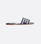 Dway Versatile Slide – the vibrant blue upper has an embroidered Christian Paris signature for an instantly – LUX VERSE Luxury Designer Fashion Outlet