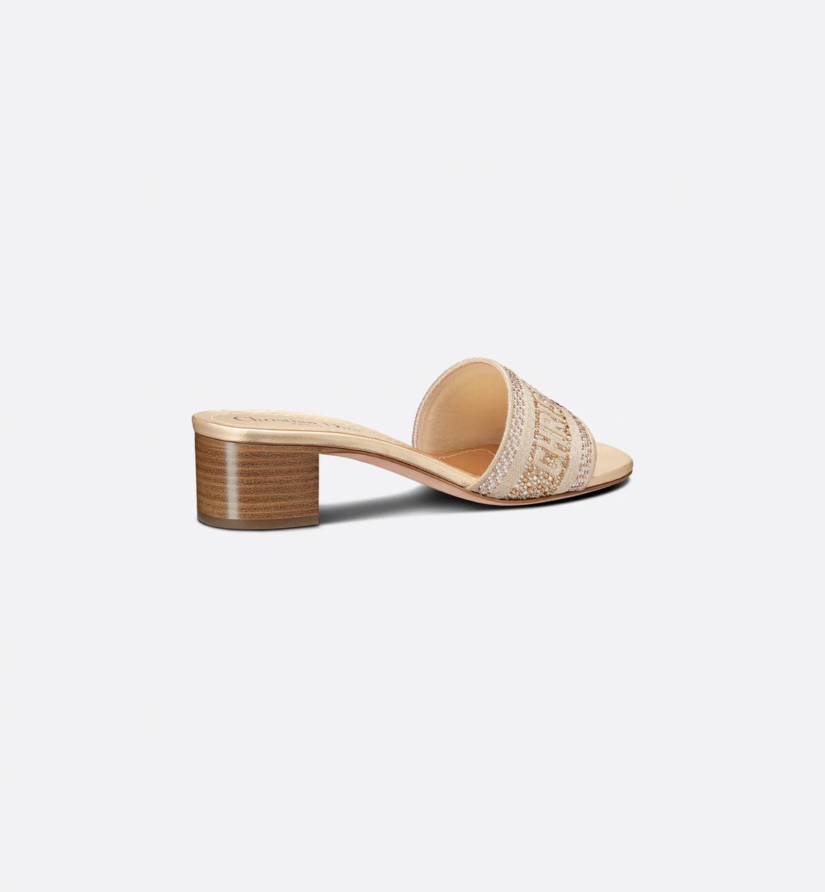 Dway Sleek Heeled Slide – the embroidered upper, with its'CHRISTIAN'signature makes it an immediate – LUX VERSE Luxury Designer Fashion Outlet
