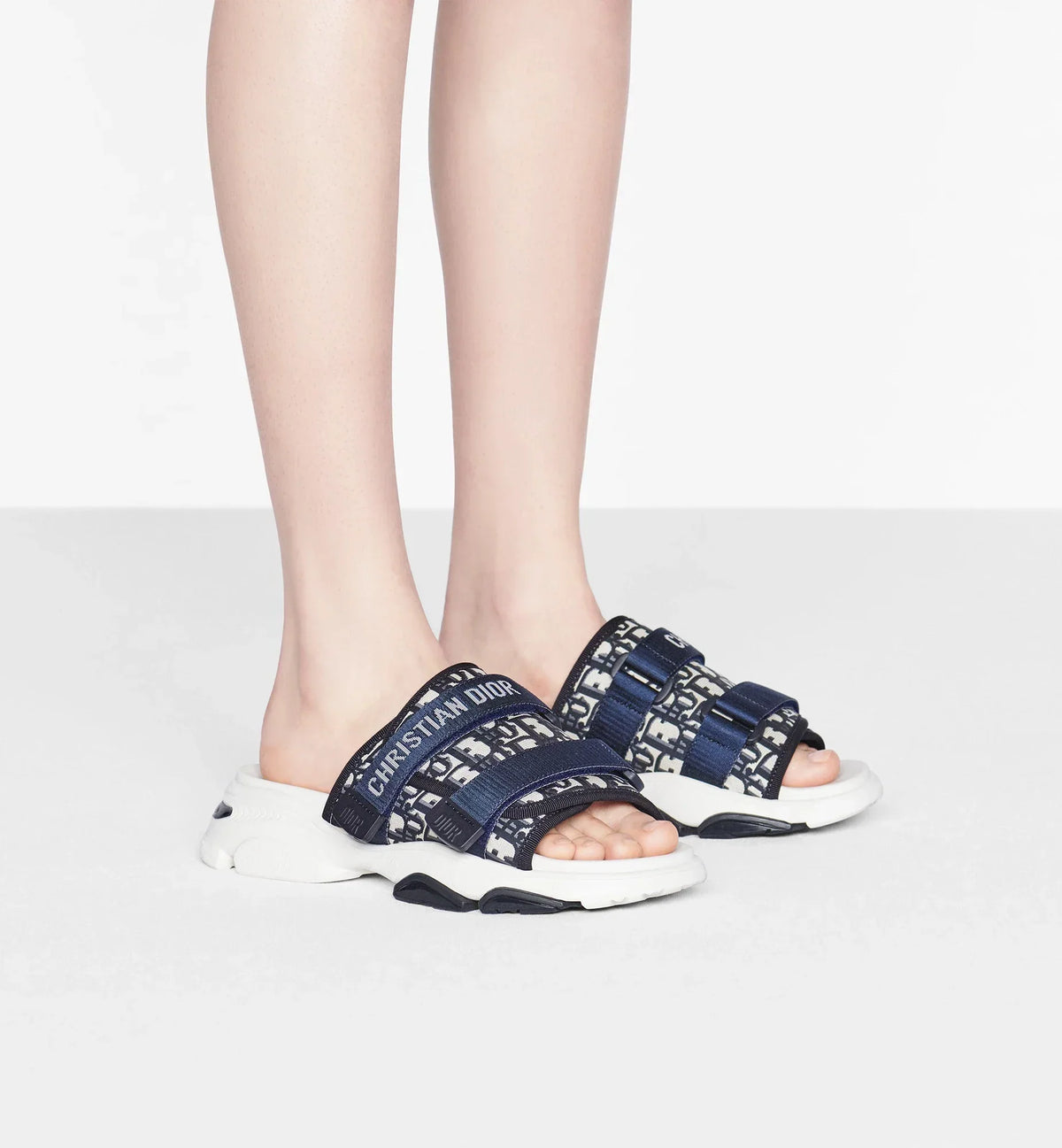 D-Wander Oblique Slide – the D-Wander slide is a hybrid design combining both sneaker and sandal – LUX VERSE Luxury Designer Fashion Outlet