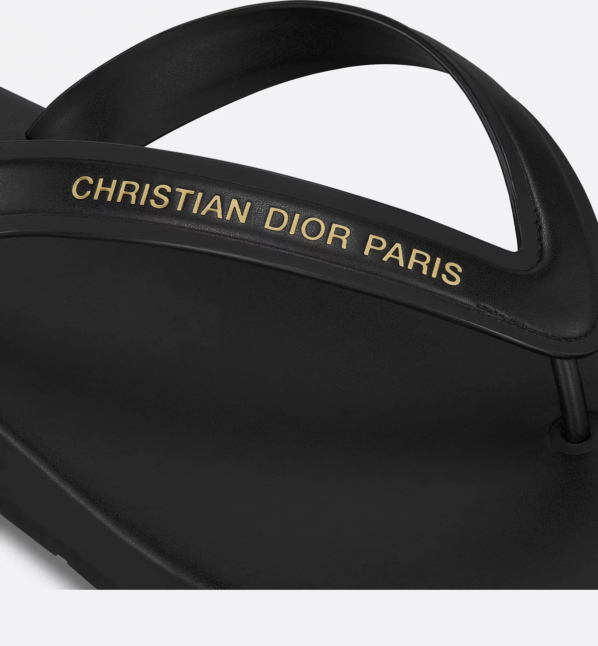 Thong Trendy Sandal – its platform silhouette is crafted in black leather-effect fabric, while the strap – LUX VERSE Luxury Designer Fashion Outlet