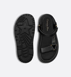 D-Wave Trendy Sandal – the style has black lambskin straps enhanced by the gold-tone Christian Paris – LUX VERSE Luxury Designer Fashion Outlet