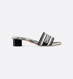 Dway Heeled Versatile Slide – completed by a 3.5-cm (1.5) cylindrical heel, the slide will add a touch – LUX VERSE Luxury Designer Fashion Outlet