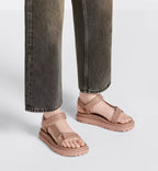 D-Wave aesthetic Sandal – the style has powder pink lambskin straps enhanced by the gold-tone Christian Paris – LUX VERSE Luxury Designer Fashion Outlet