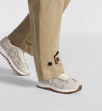 C'est Sneaker Suede Calfskin – the pairing of ecru suede calfskin and mesh is enhanced by the letters C and D on – LUX VERSE Luxury Designer Fashion Outlet