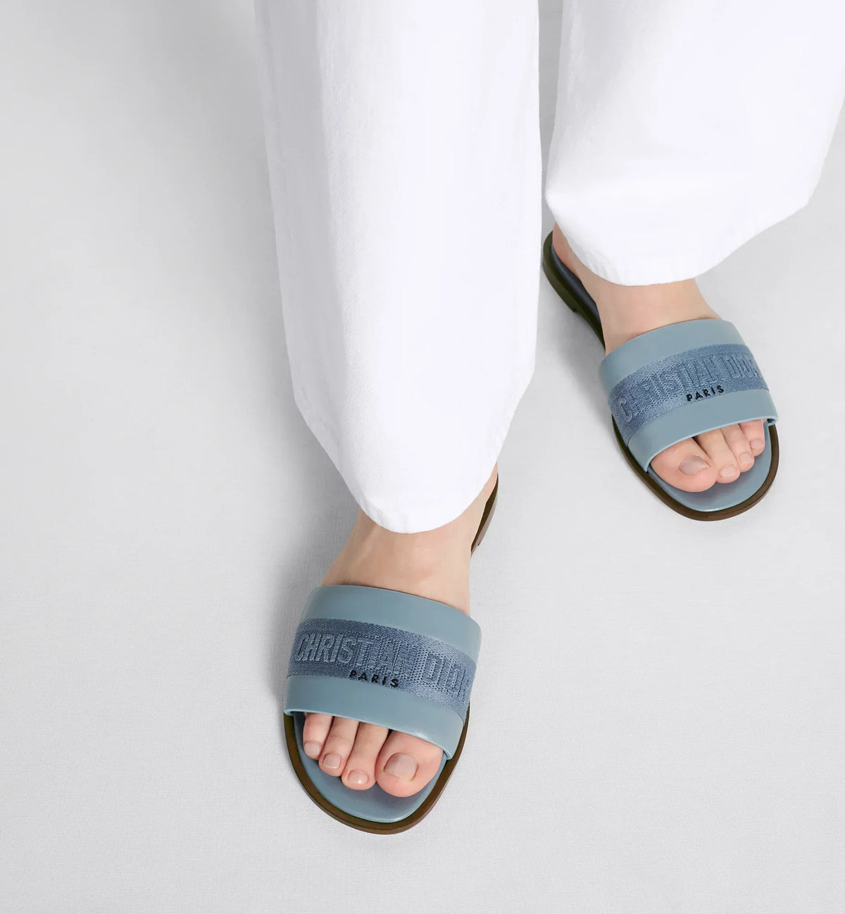 Dway emblematic Slide – the upper in pastel blue calfskin and cotton embroidered with the Christian Paris – LUX VERSE Luxury Designer Fashion Outlet