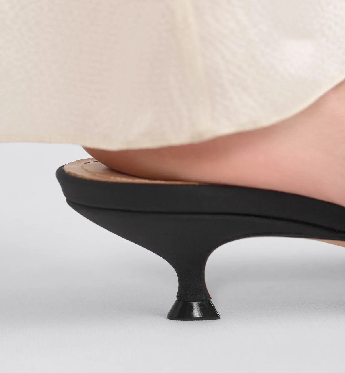 D-Dream Heeled Slide – the black fabric upper showcases the House's hallmark bee motif delicately – LUX VERSE Luxury Designer Fashion Outlet