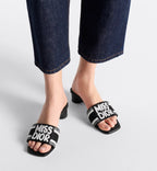 Dway Heeled Slide – the black and white embroidered cotton upper features an elegant square toe – LUX VERSE Luxury Designer Fashion Outlet