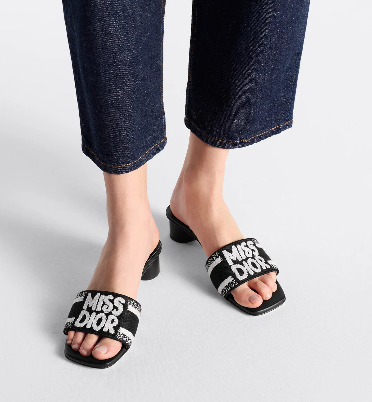 Dway Heeled Slide – the black and white embroidered cotton upper features an elegant square toe – LUX VERSE Luxury Designer Fashion Outlet