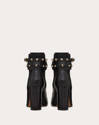 Rockstud Grainy Calfskin Ankle Boot 90 Mm – platinum-finish studs- Tonal elasticated side panels- Adjustable calfskin – LUX VERSE Luxury Designer Fashion Outlet
