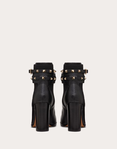 Rockstud Grainy Calfskin Ankle Boot 90 Mm – platinum-finish studs- Tonal elasticated side panels- Adjustable calfskin – LUX VERSE Luxury Designer Fashion Outlet