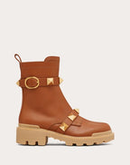 Roman Stud Calfskin Combat Boot 40mm – roman Stud combat boot in calfskin with straps embellished with maxi studs – LUX VERSE Luxury Designer Fashion Outlet