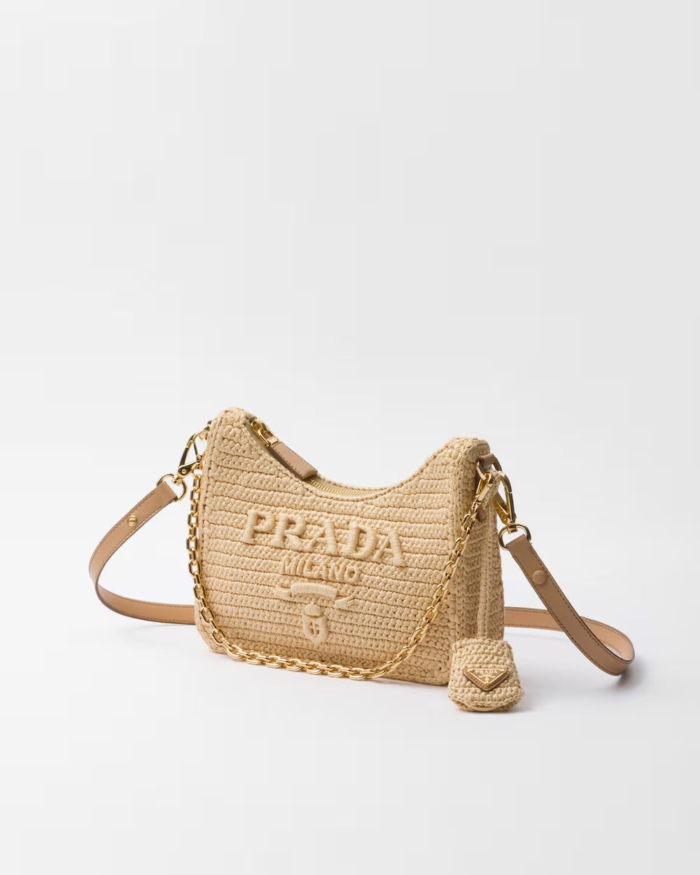 Re-edition Crochet Mini-Bag – the accessory with a zipper closure and removable key ring is decorated with – LUX VERSE Luxury Designer Fashion Outlet