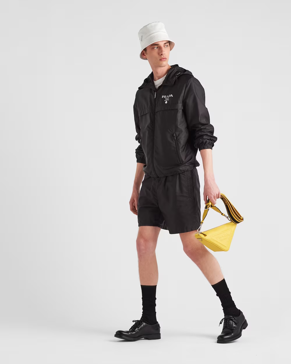 Re-Nylon swim trunks – the embroidered lettering logo adds an iconic touch to the garment, accompanied by a – LUX VERSE Luxury Designer Fashion Outlet