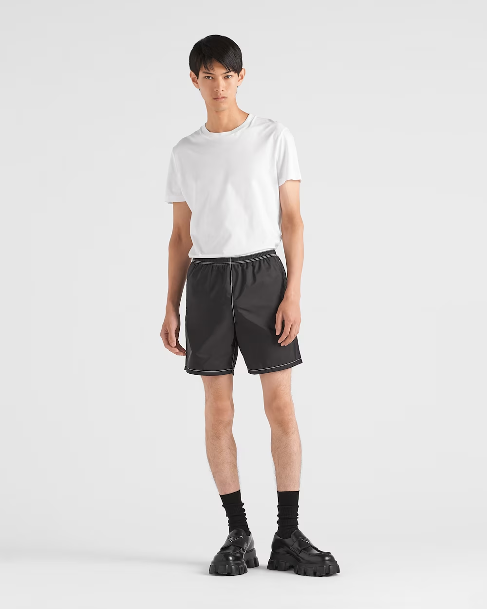 Re-Nylon swimsuit – the enameled metal triangle logo adds an iconic note to the style accompanied by a – LUX VERSE Luxury Designer Fashion Outlet