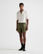 Re-Nylon swim trunks – the style with a classic silhouette, characterized by the elasticized waistband, is – LUX VERSE Luxury Designer Fashion Outlet