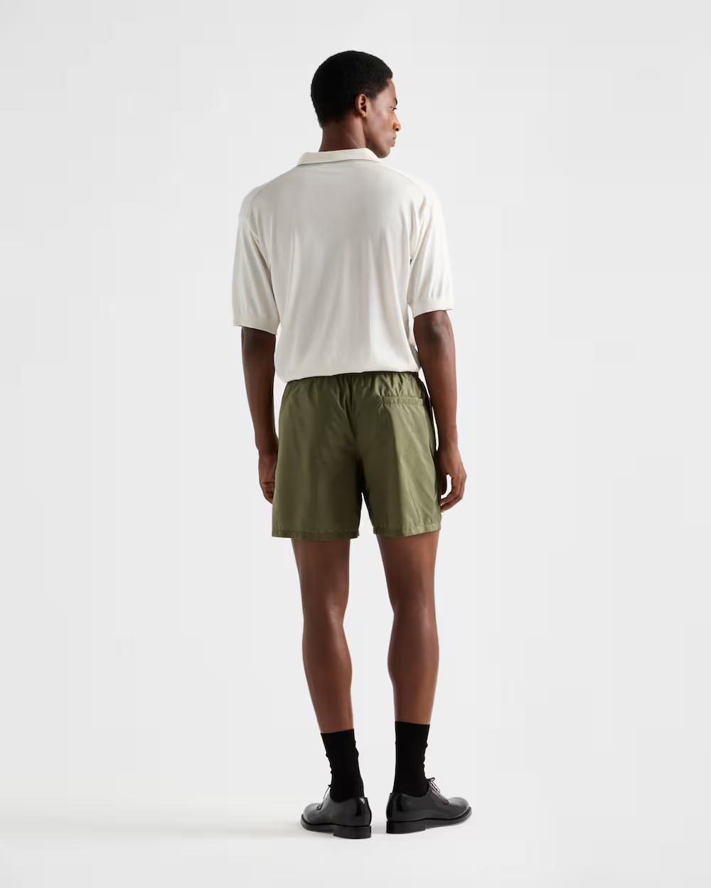 Re-Nylon swim trunks – the style with a classic silhouette, characterized by the elasticized waistband, is – LUX VERSE Luxury Designer Fashion Outlet