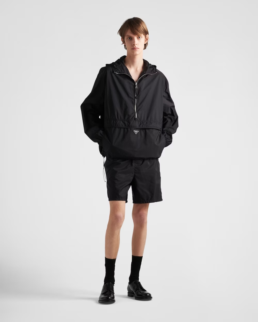 Re-Nylon swim trunks – the style with a classic silhouette, characterized by the elasticized waistband, is – LUX VERSE Luxury Designer Fashion Outlet