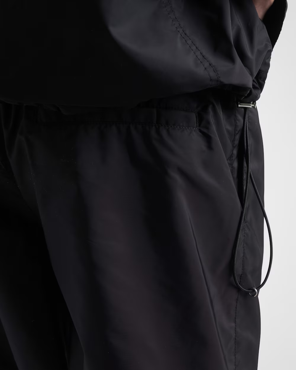 Re-Nylon swim trunks – these swim trunks with a sleek, sporty design are made of Re-Nylon, the innovative – LUX VERSE Luxury Designer Fashion Outlet
