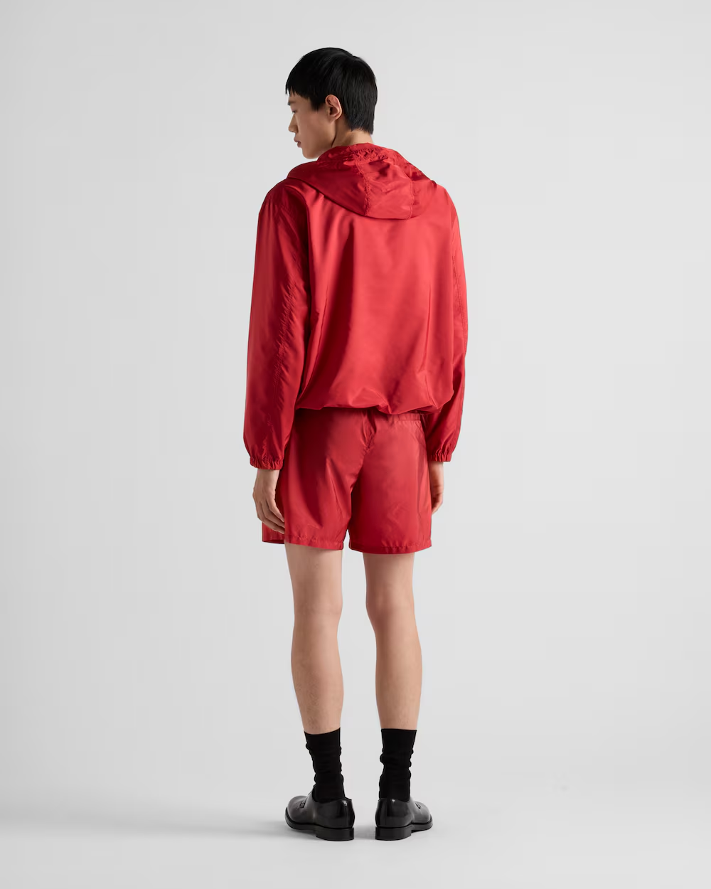 Re-Nylon swim trunks – the style with a classic silhouette, characterized by the elasticized waistband, is – LUX VERSE Luxury Designer Fashion Outlet