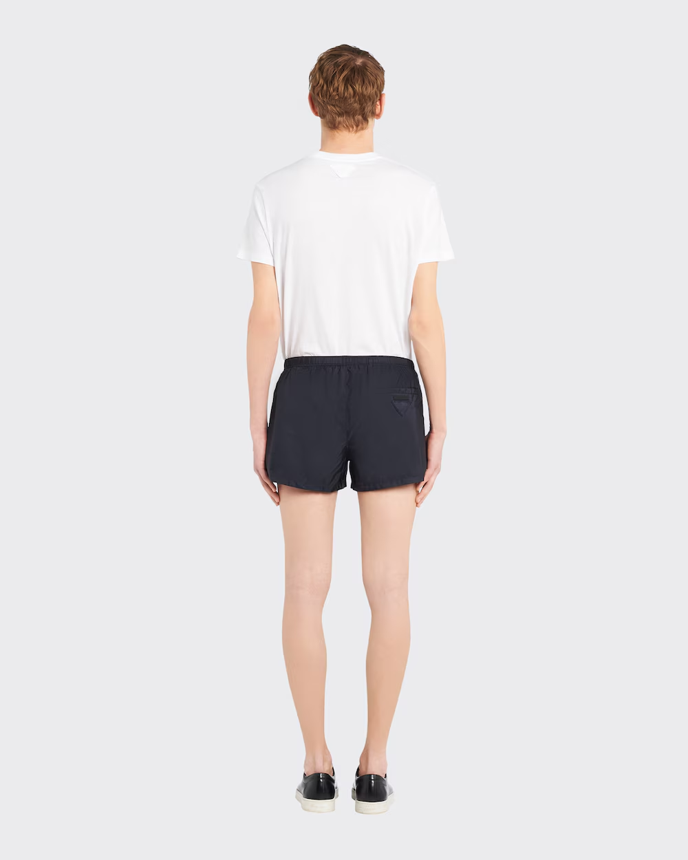 Nylon swim trunks – this swimsuit with a sleek design is decorated with the fabric triangle logo and – LUX VERSE Luxury Designer Fashion Outlet